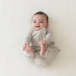 Clearance Kyte Baby Ribbed Ruffle Zipper Romper in Oat