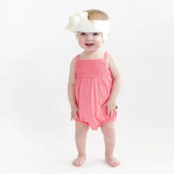 New Kyte Baby Smocked Bubble Romper in Guava