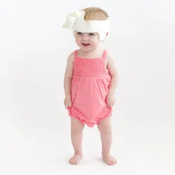 New Kyte Baby Smocked Bubble Romper in Guava