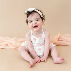 New Kyte Baby Spaghetti Strap Ruffle Romper in Bow