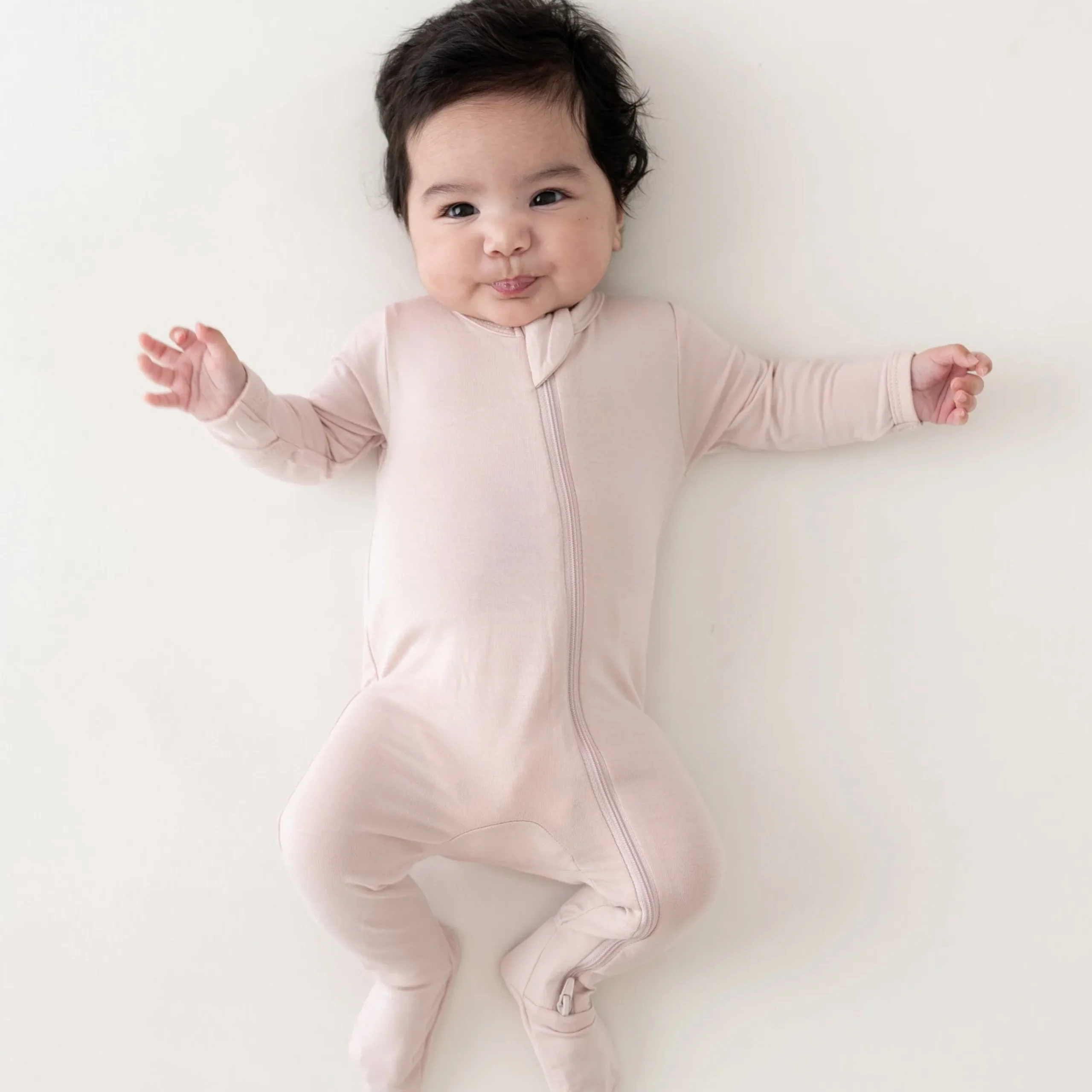 Online Kyte Baby Zippered Footie in Blush