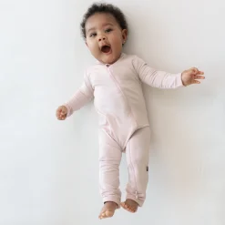 Online Kyte Baby Zippered Romper in Blush