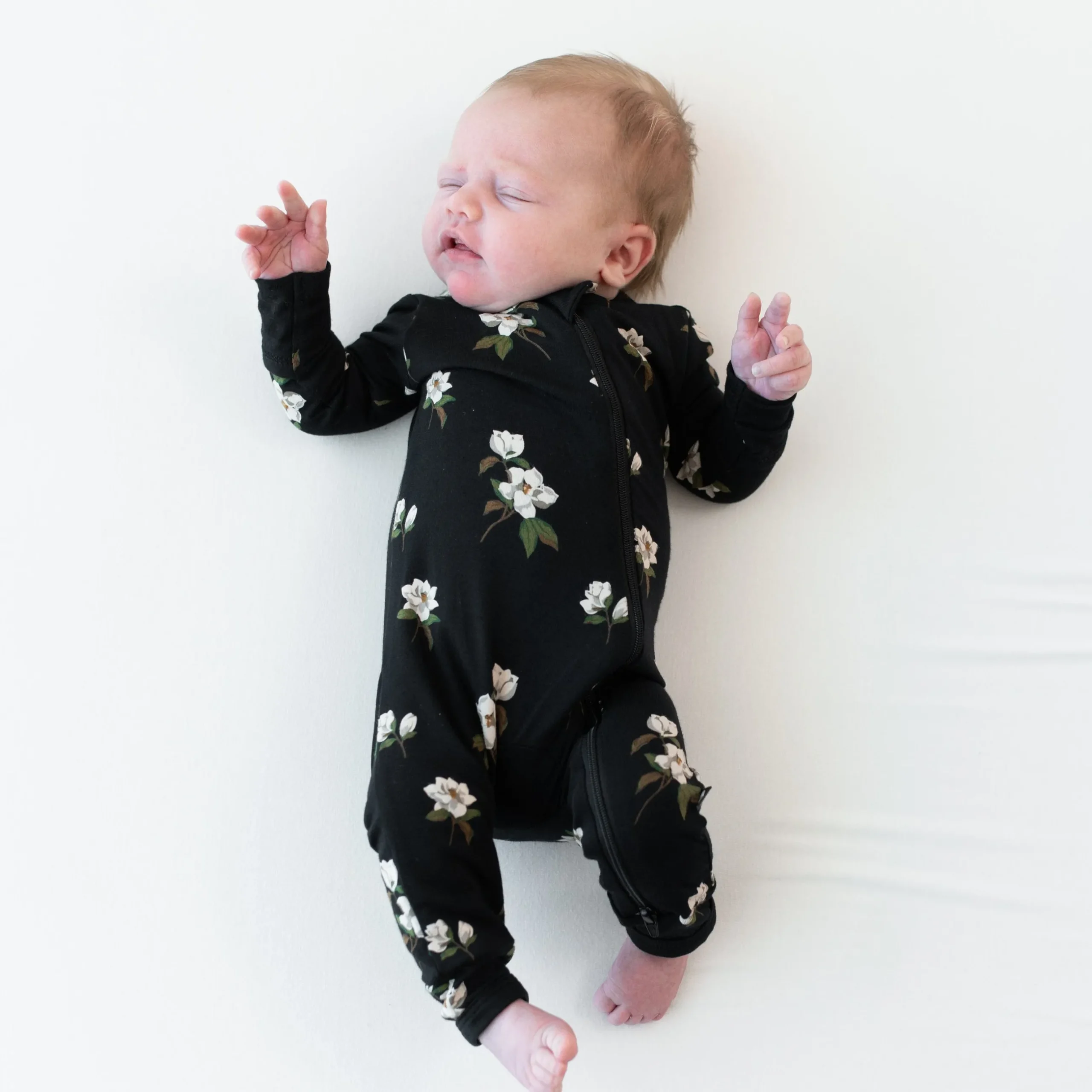 Clearance Kyte Baby Zippered Romper in Small Midnight Magnolia