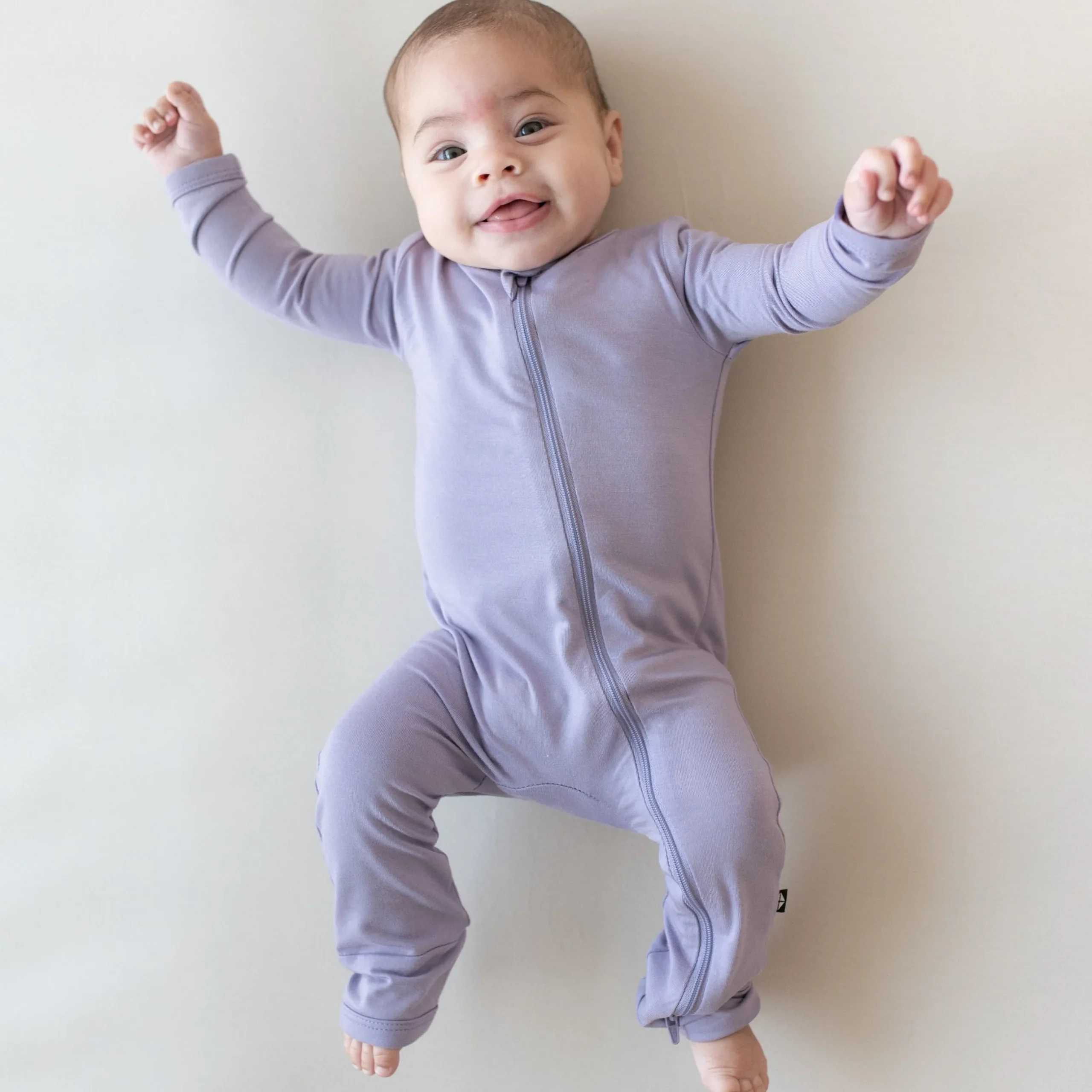 Clearance Kyte Baby Zippered Romper in Taro