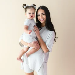 New Kyte Baby Zippered Shortall Romper in Oat