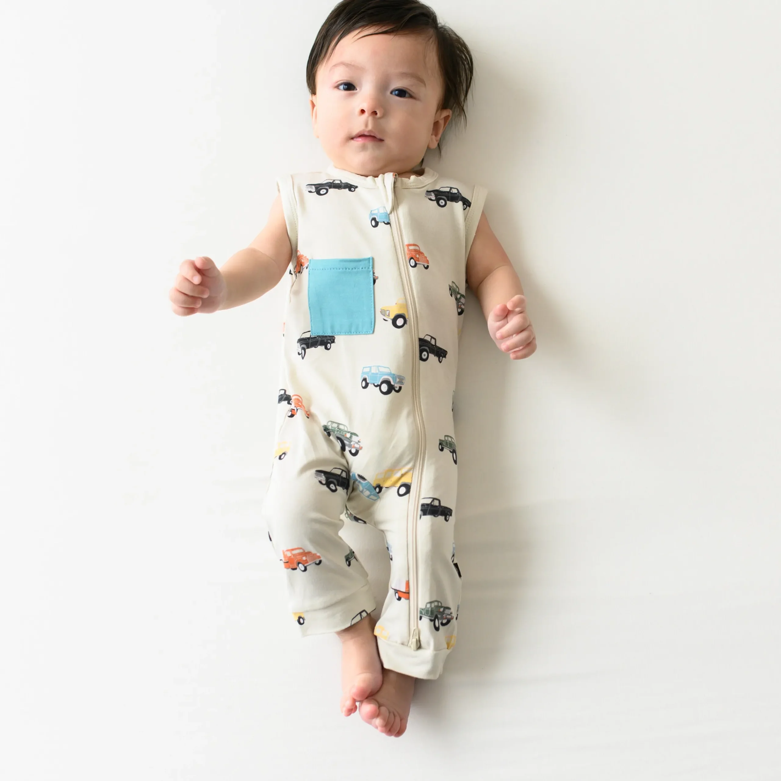 Sale Kyte Baby Zippered Sleeveless Romper in Vintage Truck