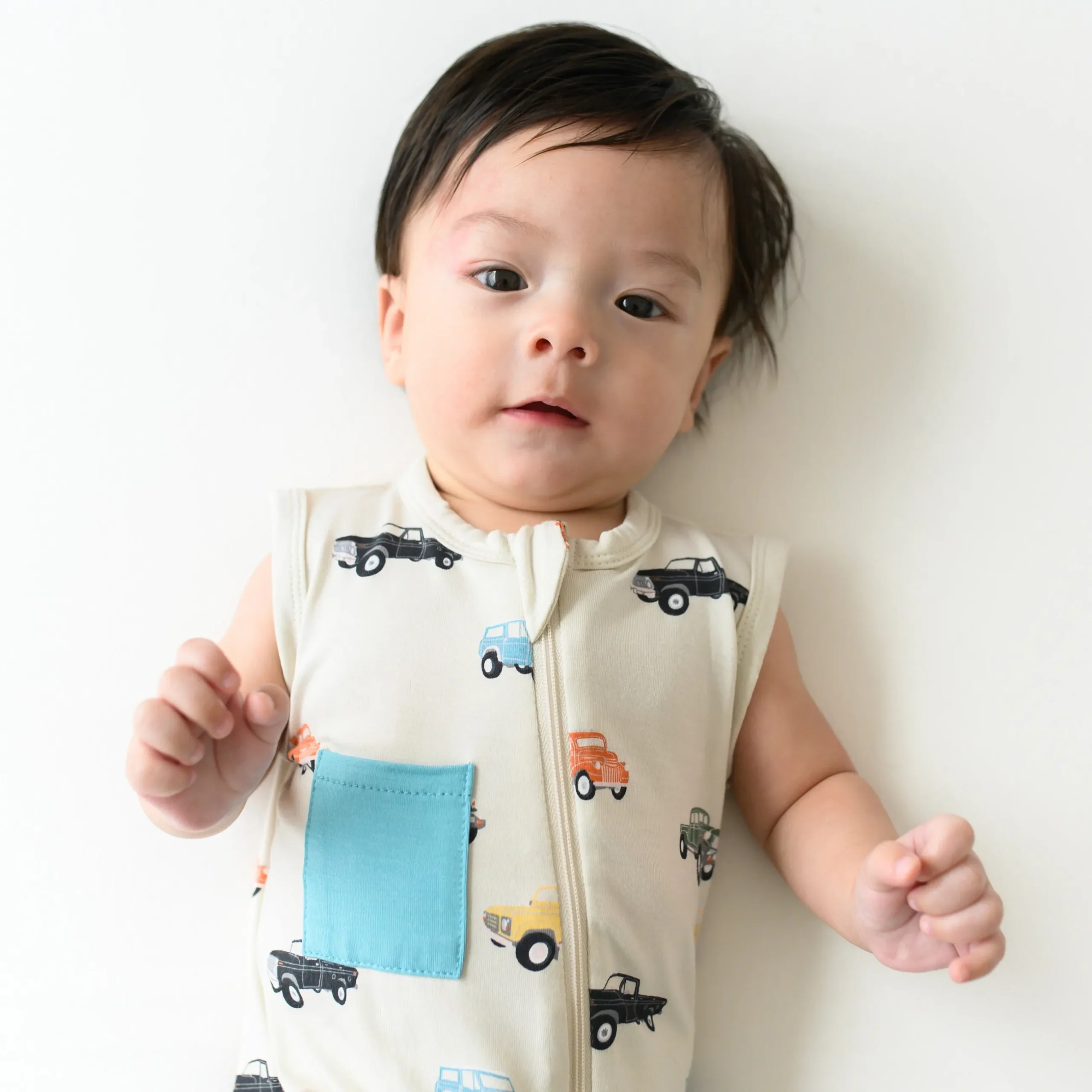 Sale Kyte Baby Zippered Sleeveless Romper in Vintage Truck