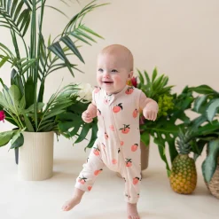 New Kyte Baby Zippered Sleeveless Romper in Peach